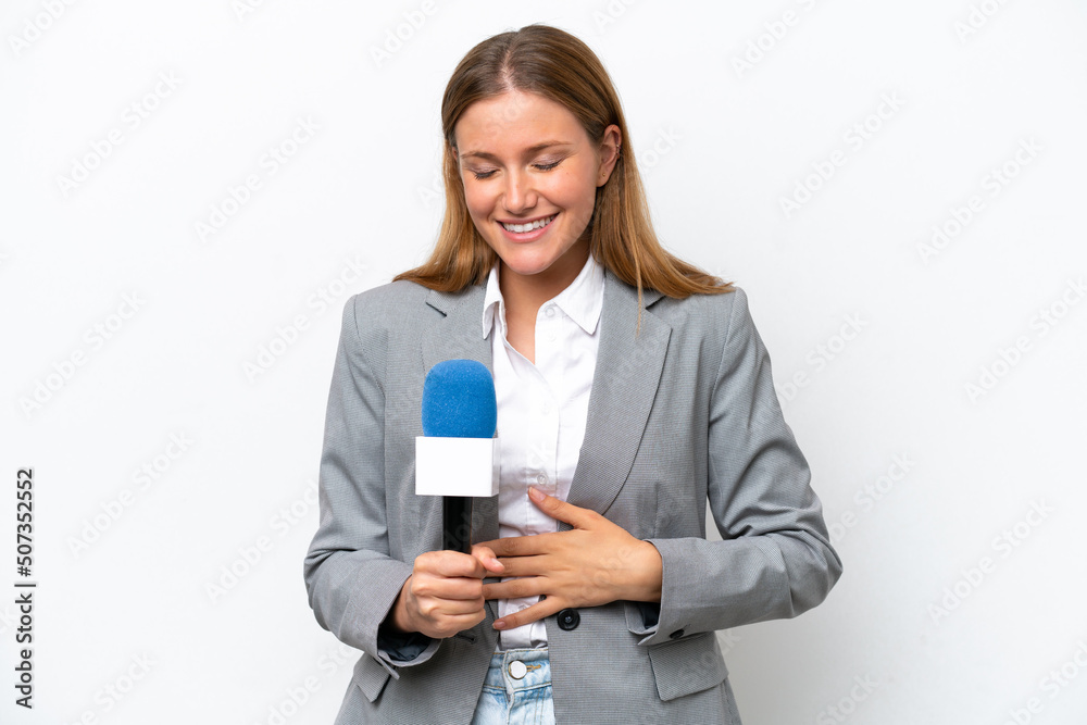 Young caucasian tv presenter woman isolated on white background smiling a lot Young caucasian tv presenter woman isolated on white background smiling a lot
