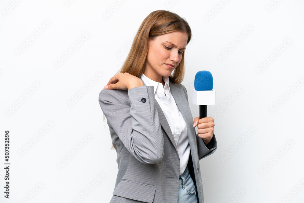 Young caucasian tv presenter woman isolated on white background suffering from pain in shoulder for having made an effort Young caucasian tv presenter woman isolated on white background suffering from pain in shoulder for having made an effort