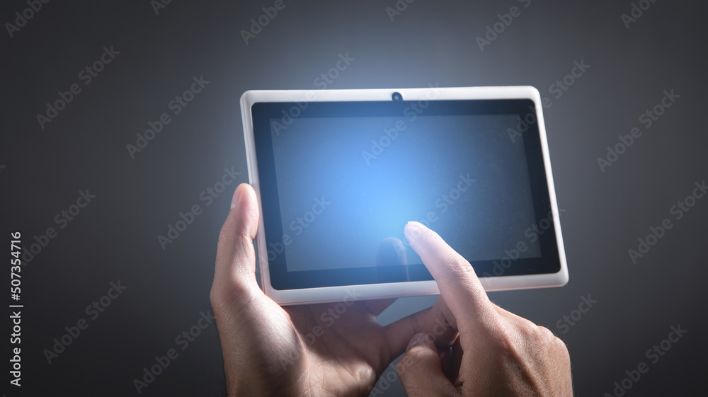 Businessman using white digital tablet. Businessman using white digital tablet.