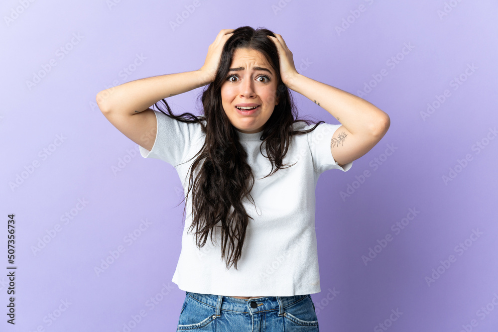 Young caucasian woman isolated on purple background doing nervous gesture Young caucasian woman isolated on purple background doing nervous gesture