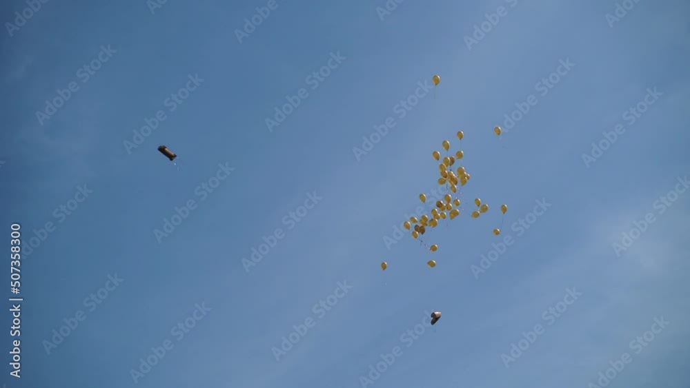 Many colorful balloons flying in the air. Celebration and birthday concept. High quality FullHD footage Many colorful balloons flying in the air. Celebration and birthday concept. High quality FullHD footage