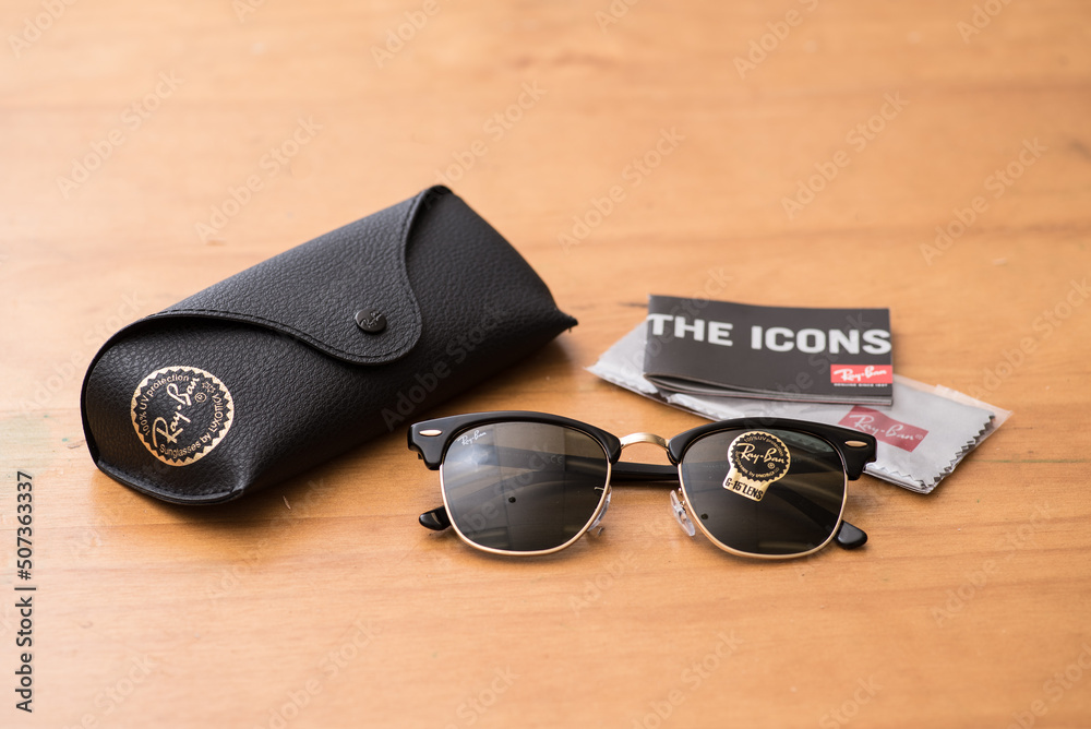 Ray-Ban Black Clubmaster with Gold frame and classic G-15 Lens. Ray-Ban is  a brand of sunglasses and eyeglasses founded in 1937 by American company  Bausch & Lomb. Stock Photo | Adobe Stock