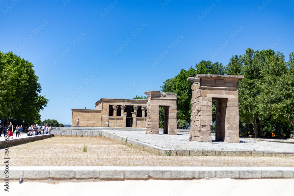 Temple of Debod. Surroundings of Temple of Debod in Madrid on a clear day with blue sky, in Spain. Green gardens with splendid flowering plants and shrubs in the spring. Europe. Photography.