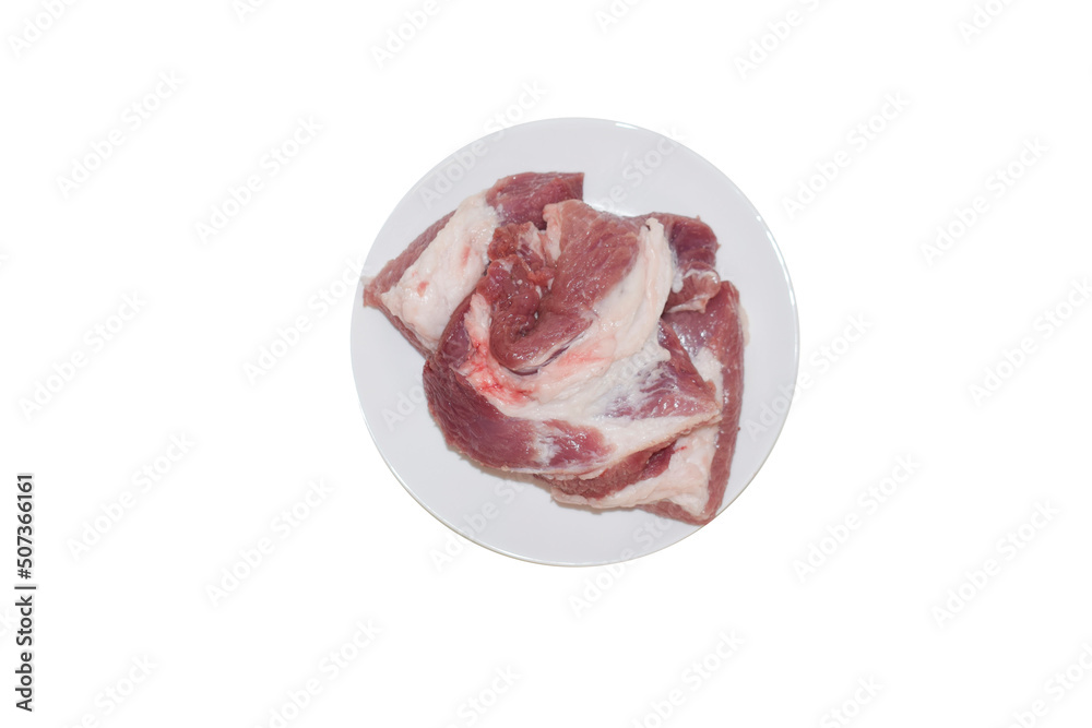 Slice of pork entrecote on a plate isolated on white background, top view. Slice of pork entrecote on a plate isolated on white background, top view.