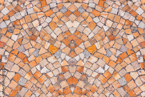 Small red-orange tiles, arranged as a mosaic. Typical pavement of ancient churches.