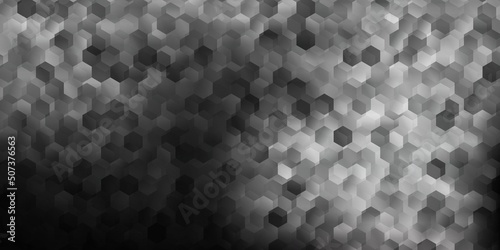 Dark gray vector backdrop with a batch of hexagons.