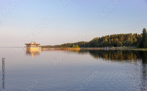 Beautiful summer sunset over the northern lake.