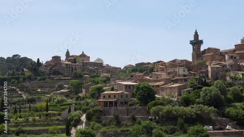 Pan shot over Valldemossa traditional village in the Tramuntana mountain - Valldemossa, Mallorca, Balearic Islands, Spain