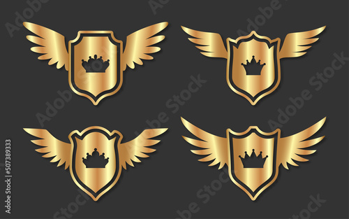 Shield wing crown metal safety badge gold flat set. Elegant military emblem protection security badge. Award high quality royal dynasty coat arms. Retro safe shape template heraldry medieval isolated