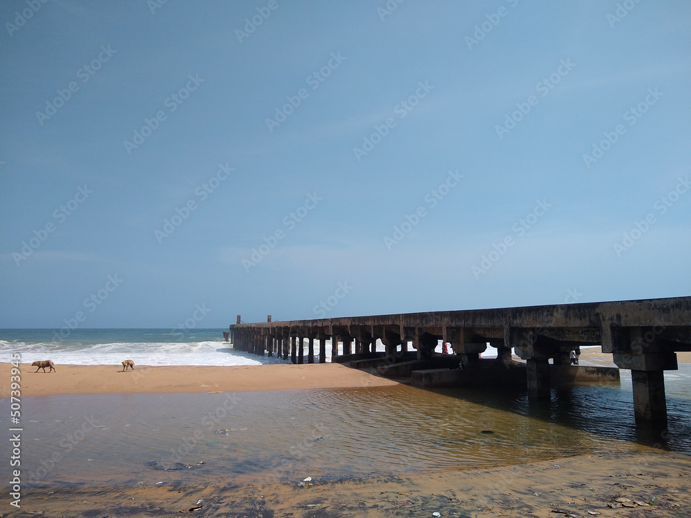 Colachel beach and old sea bridge, Kanyakumari district, Tamil Nadu, seascape view