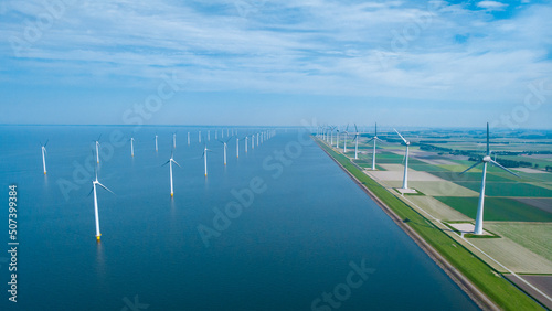 Bilde på lerret Windmill park in the ocean, drone aerial view of windmill turbines generating green energy electric, windmills isolated at sea in the Netherlands