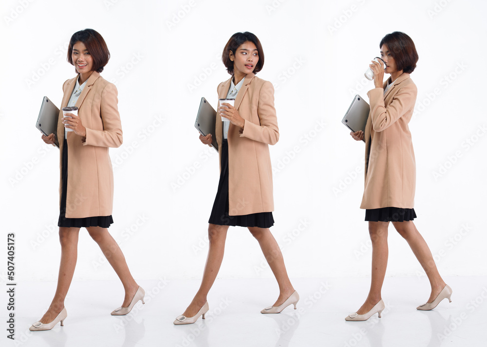 Obraz premium Full length 20s young Asian Business Woman businesswoman wear blazer skirt, walking forward right