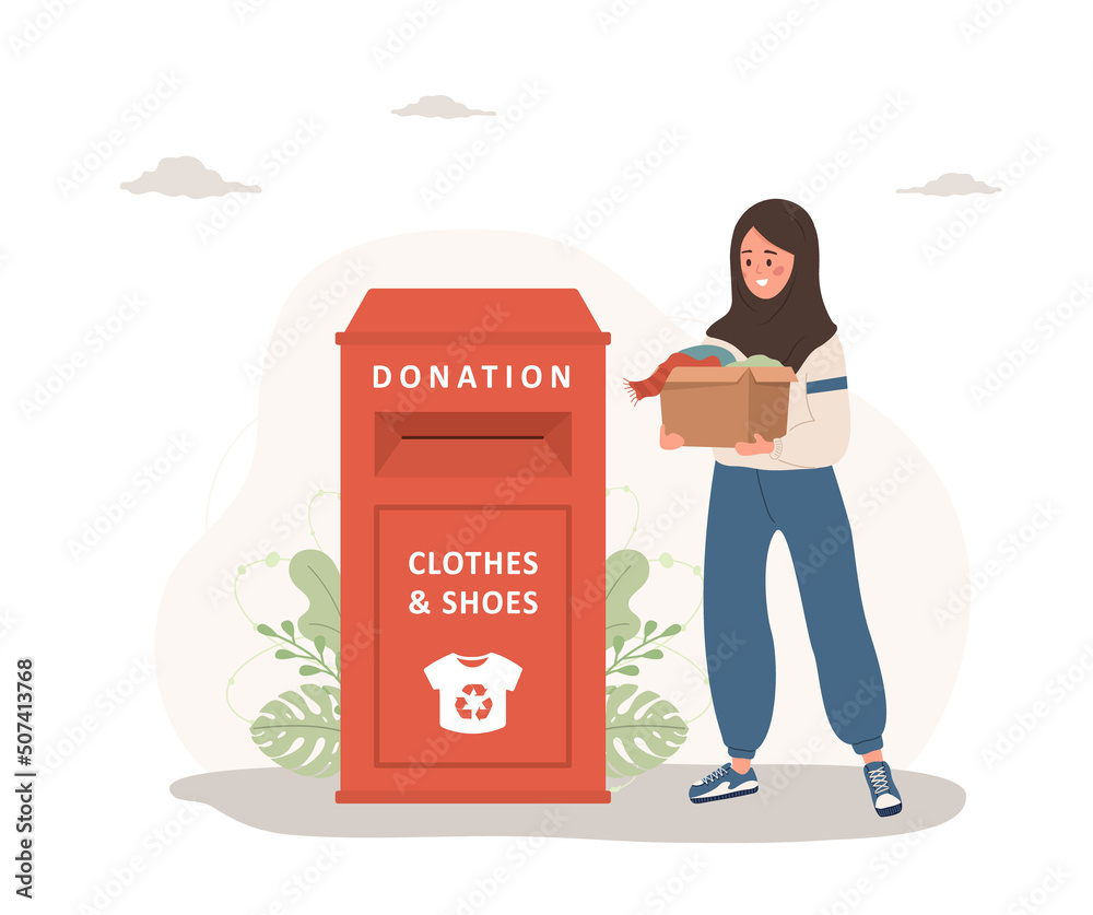 Clothes donation. Islamic woman with cardboard box gives things for