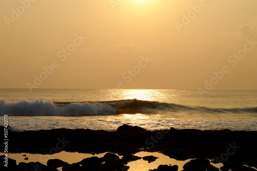 sunset on the beach photo