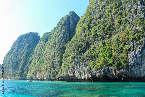 Horizontal image of the turquoise waters and limestone islands, Phi Phi islands, Phuket, Thailand. Copy space for text © Tatiana Kashko