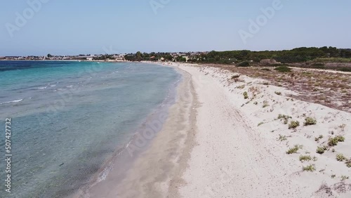 Aerial drone view of the beach and harbour of Portopalo di Capo Passero. Turquoise water in Sicily. photo