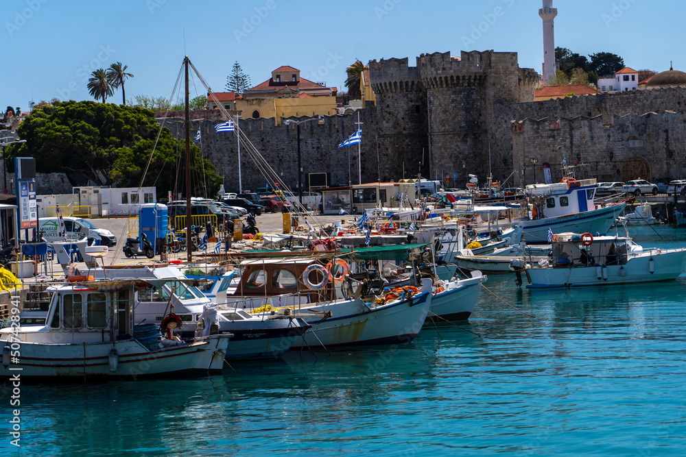12.04.2022 fishing boats in Kolona Harbor, the second biggest commercial harbor on the island in Rhodes Greece.