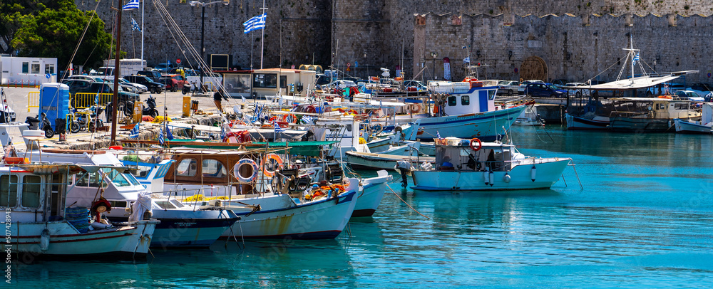 12.04.2022 fishing boats in Kolona Harbor, the second biggest commercial harbor on the island in Rhodes Greece.