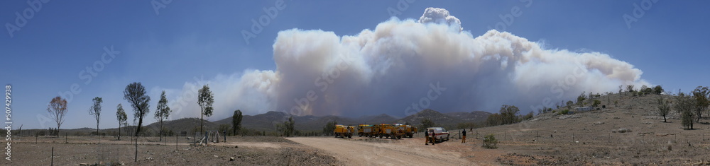 Fototapeta premium Fire Fighters Prepare as a Bush Fire Burns in New South Wales