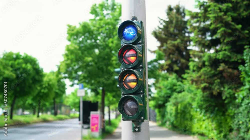 Bicycle Traffic light. Light switching between Red, Green, Orange and back to Red light. Blue light with Bike icon