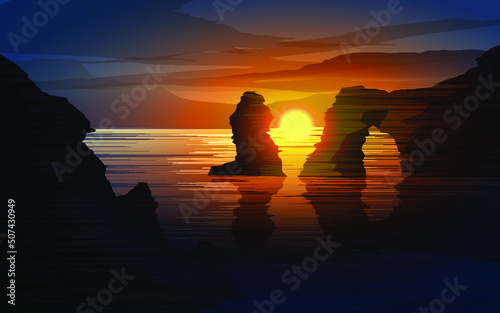 silhouette of rocks in the beach at sunset