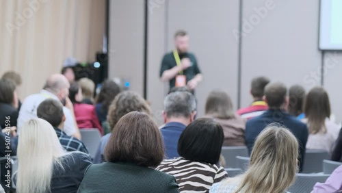 Audience listens to the lecturer at the conference