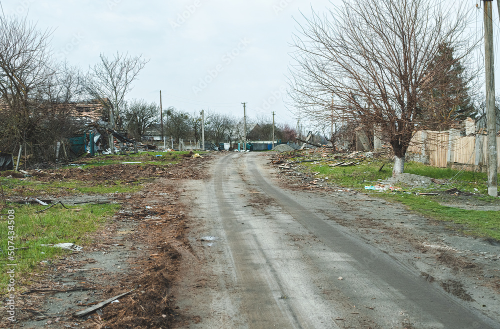 The war in Ukraine, the view of the village affected by the explosions, the road in the destroyed village The war in Ukraine, the view of the village affected by the explosions, the road in the destroyed village