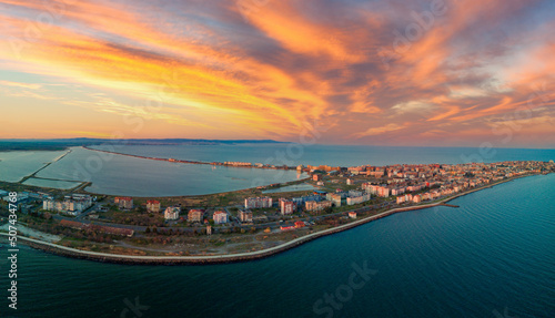 Panoramic view from a height above the town of Pomorie with houses and streets washed by the Black Sea in Bulgaria © YouraPechkin