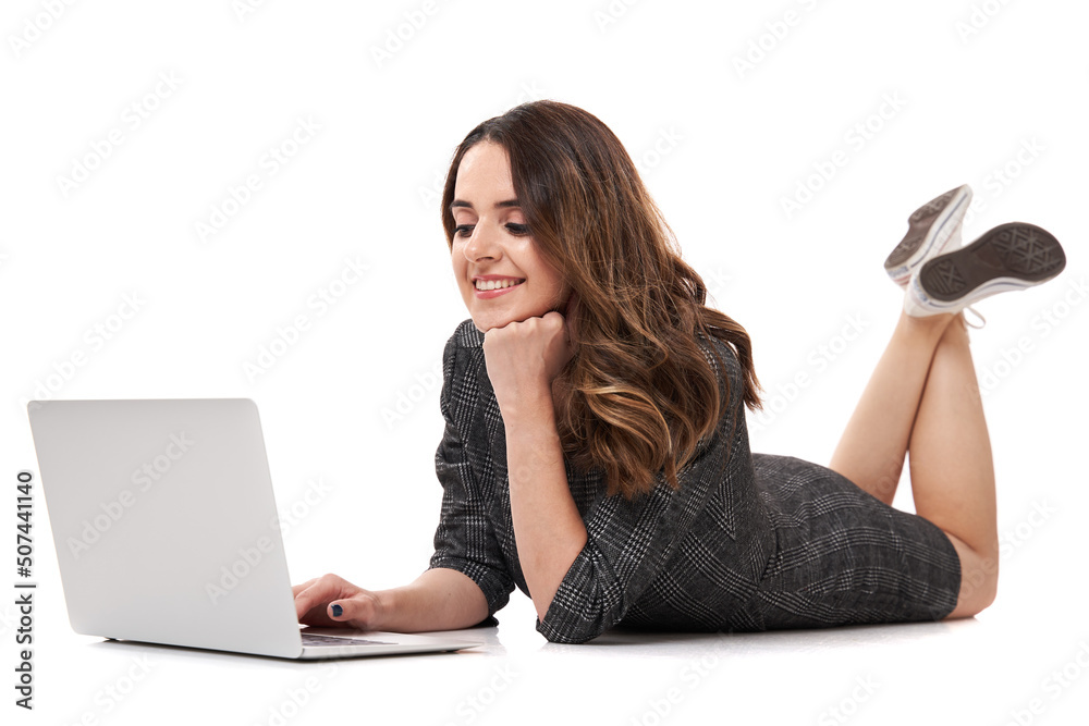 Naklejka premium Businesswoman working on the laptop on the floor