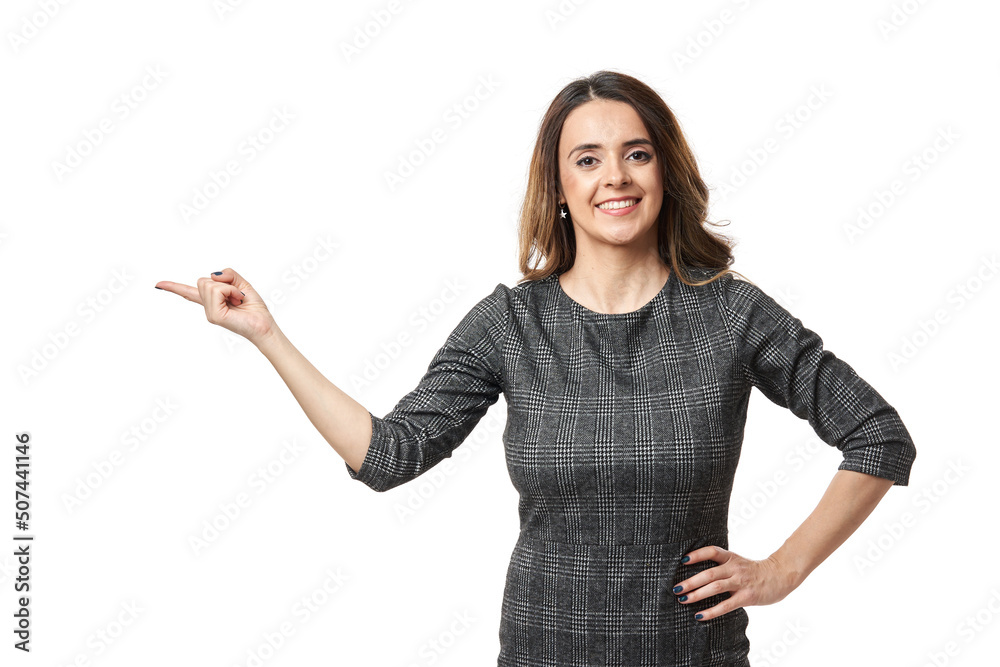 Happy businesswoman pointing to the side Happy businesswoman pointing to the side