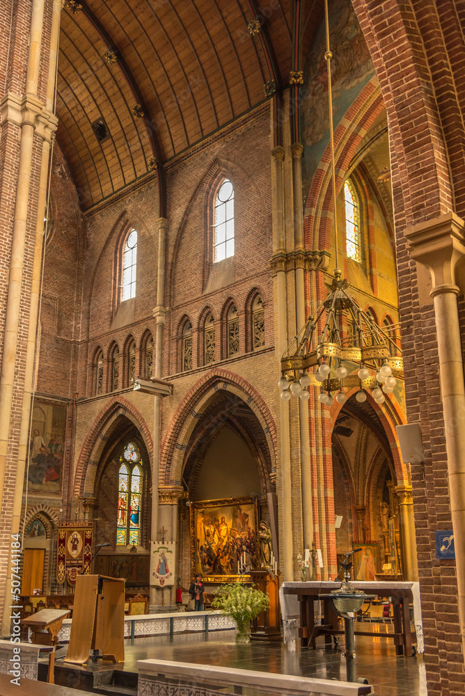 Alkmaar, Netherlands, May 2022. The interior of a church with religious artifacts.