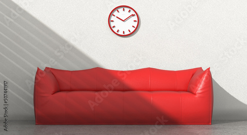 Arredo interno composto da divano rosso ed orologio da parete rosso photo