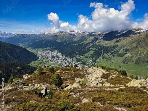 Davos, View of the highest town in the Alps from mount Seehorn. Hiking spring.Beautiful mountain panorama in Graubunden