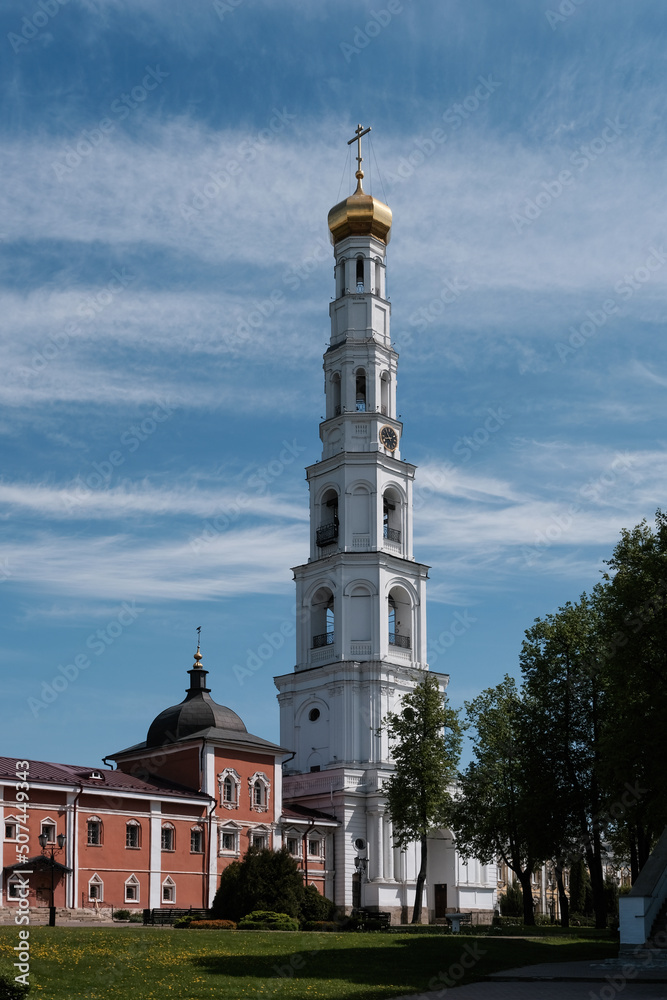 Bell tower of Nikolo-Ugreshsky monastery on sunny summer day. Dzerzhinsky, Moscow Oblast, Russia.