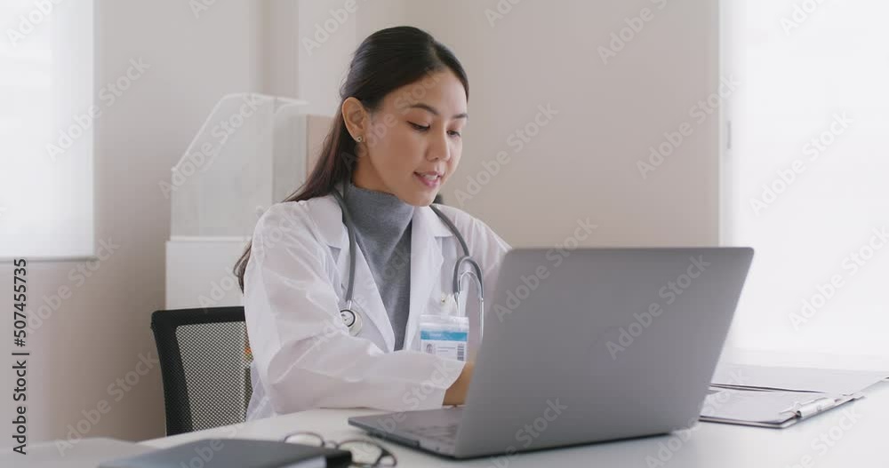Young asia people female medic live talk speak look at laptop computer work in online visit clinic care to help see patient on digital telehealth telemedicine smart covid teleconsult VoIP service app. Young asia people female medic live talk speak look at laptop computer work in online visit clinic care to help see patient on digital telehealth telemedicine smart covid teleconsult VoIP service app.