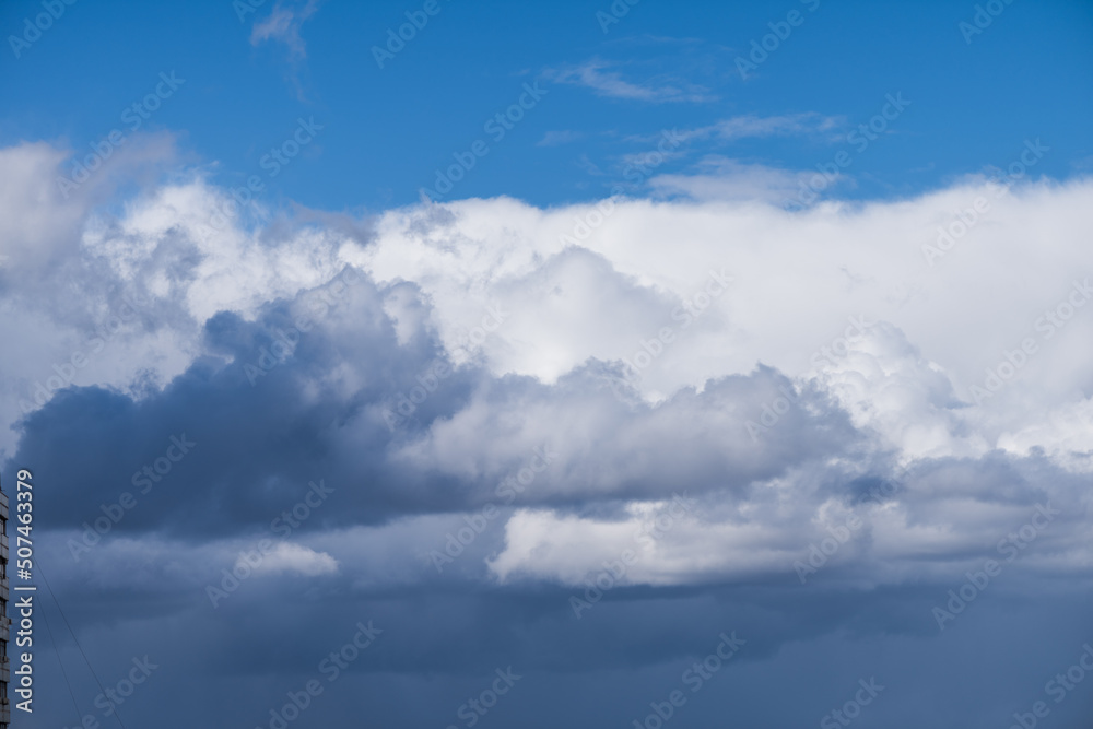 Gray overcast cloudy sky over horizon. Closeup clouds