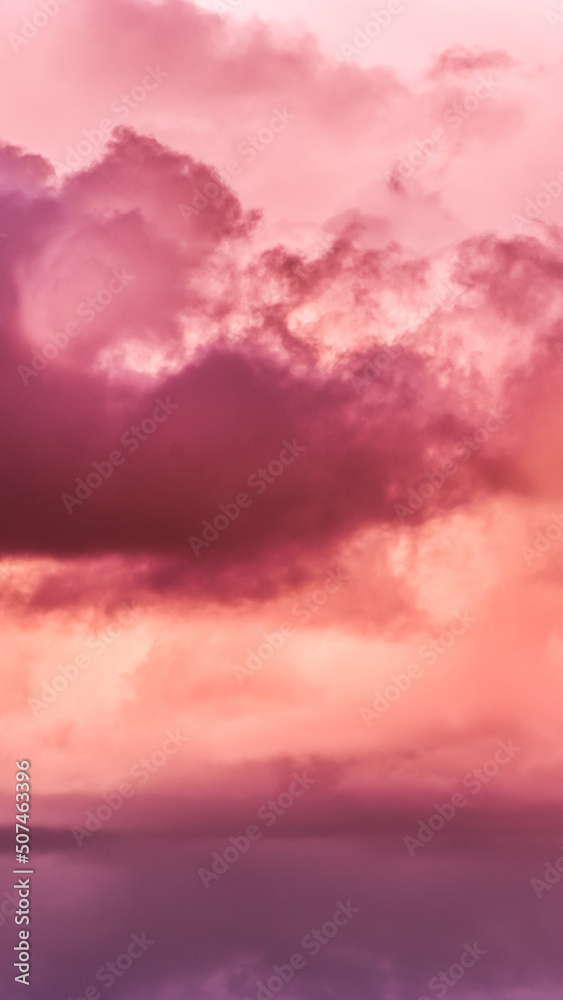 NSTA Story Template Backgrounds. Twilight sky with effect of living coral  colors. Colorful sunset of soft clouds. 9:16 Aspect Ratio