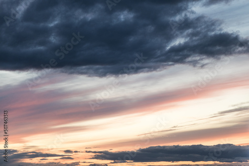 Twilight sky with effect of light pastel colors. Colorful sunset of soft clouds.