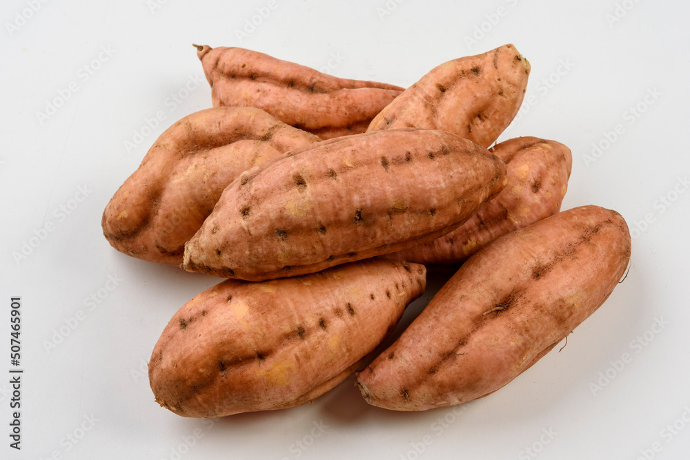 Sweet carrot potatoes isolated on white background. Sweet carrot potatoes isolated on white background.