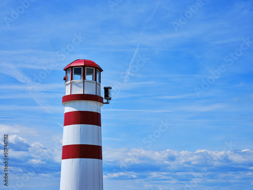 Red-white lighthouse on Lake Neusiedlersee in Podersdorf, Austria