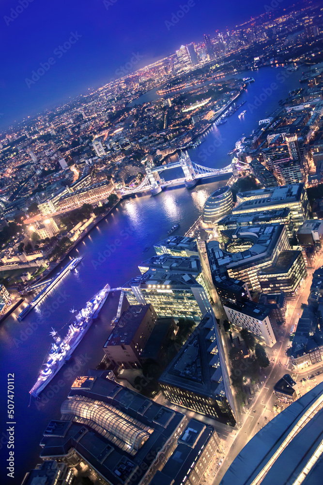 Obraz premium City of London at sunset. View include modern skyscrapers, banks and office buildings, river Thames, Tower bridge.