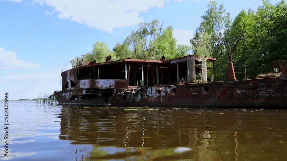 Rusty abandoned barge on the Pripyat River. Chernobyl Exclusion Zone. Ukraine. Rusty abandoned barge on the Pripyat River. Chernobyl Exclusion Zone. Ukraine.