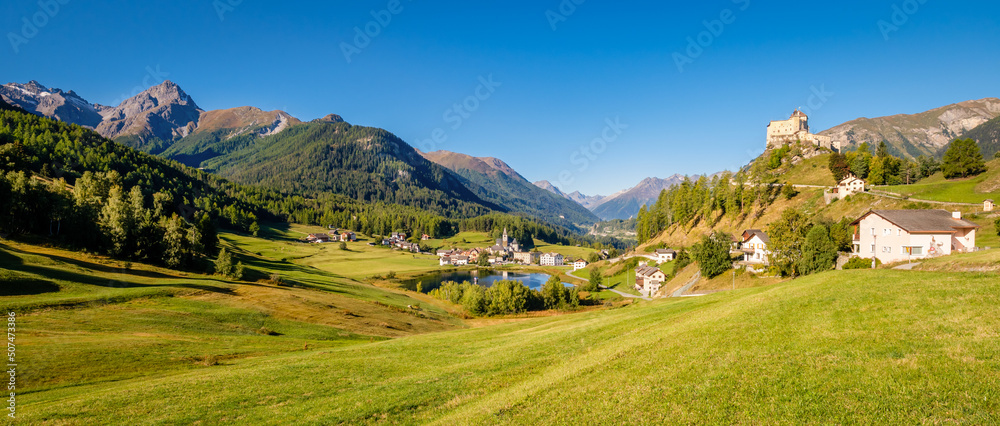 Mountains surrounding the village and castle of Tarasp (Grisons, Switzerland). It lies in the Lower Engadine Valley along the Inn River near Scuol. Tarasp Castle was built in the 11th century.