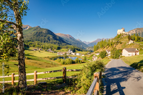 Mountains surrounding the village and castle of Tarasp (Grisons, Switzerland). It lies in the Lower Engadine Valley along the Inn River near Scuol. Tarasp Castle was built in the 11th century. photo
