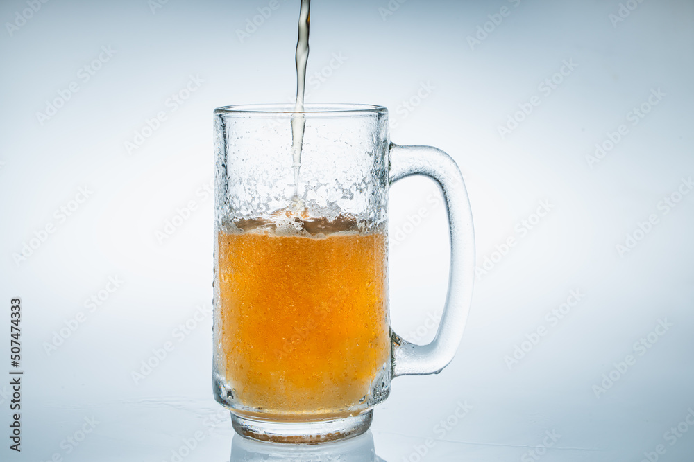 beer bubbles on a clear glass white background in the studio beer bubbles on a clear glass white background in the studio
