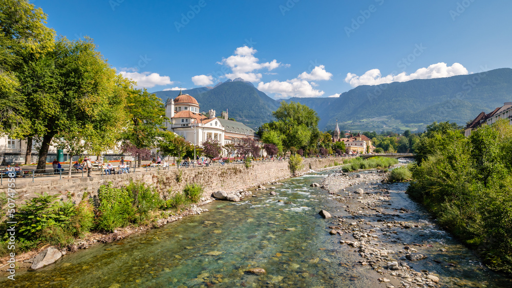 Merano (or Meran) is a city surrounded by mountains near Passeier Valley and Val Venosta (South Tyrol, Italy). The Passer river flows through Merano. It's a popular among famous artists and scientists - obrazy, fototapety, plakaty 