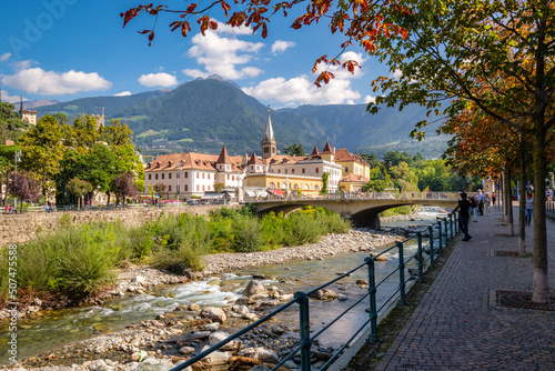 Merano (or Meran) is a city surrounded by mountains near Passeier Valley and Val Venosta (South Tyrol, Italy). The Passer river flows through Merano. It's a popular among famous artists and scientists photo