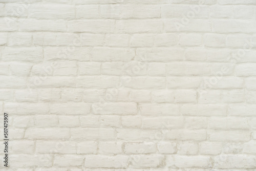 Old white brick wall. Clouseup background.