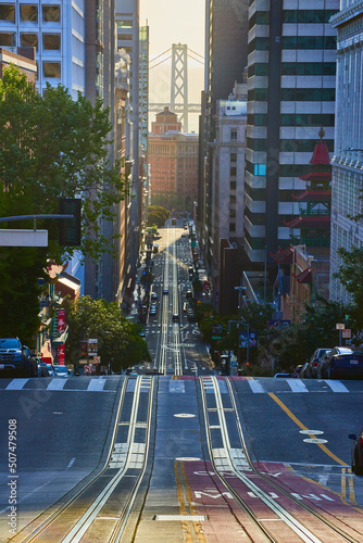 Photography Empty trolley tracks go towards Oakland Bay Bridge in downtown San Francisco mor