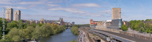 Panorama over the districts Kungsholmen and Vasastan water fronts at the canal Karlbergskanalen. Offices, the street Norra Länken and a rail yard a sunny summer day in Stockholm